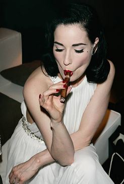 Picture of woman smoking a cigar