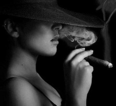 Picture of woman smoking a cigar